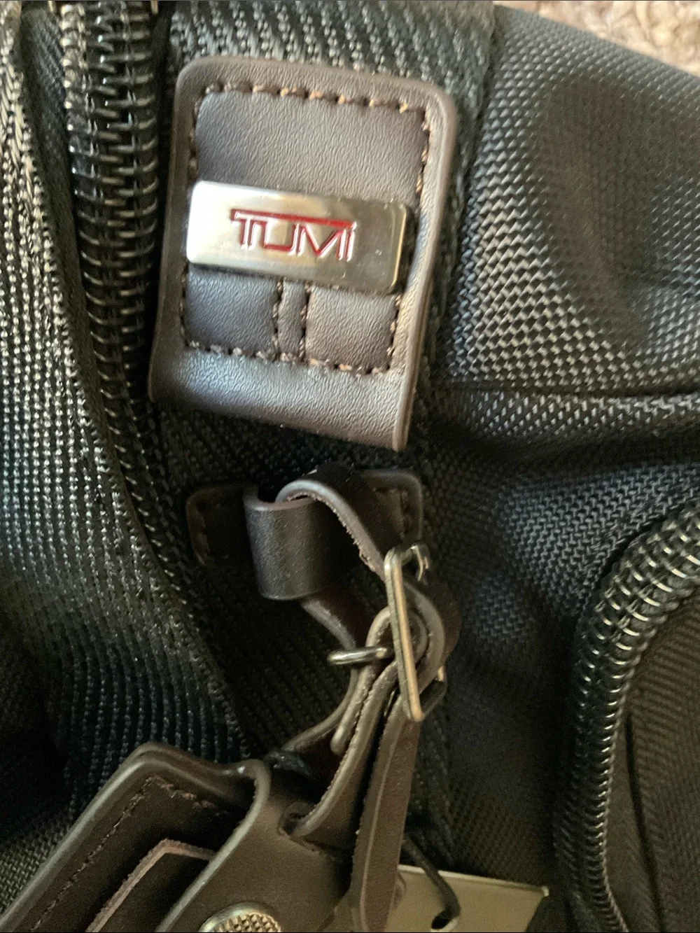 TUMI Alpha Bravo Monterey Men's Sling Backpack black-brown with leather accents